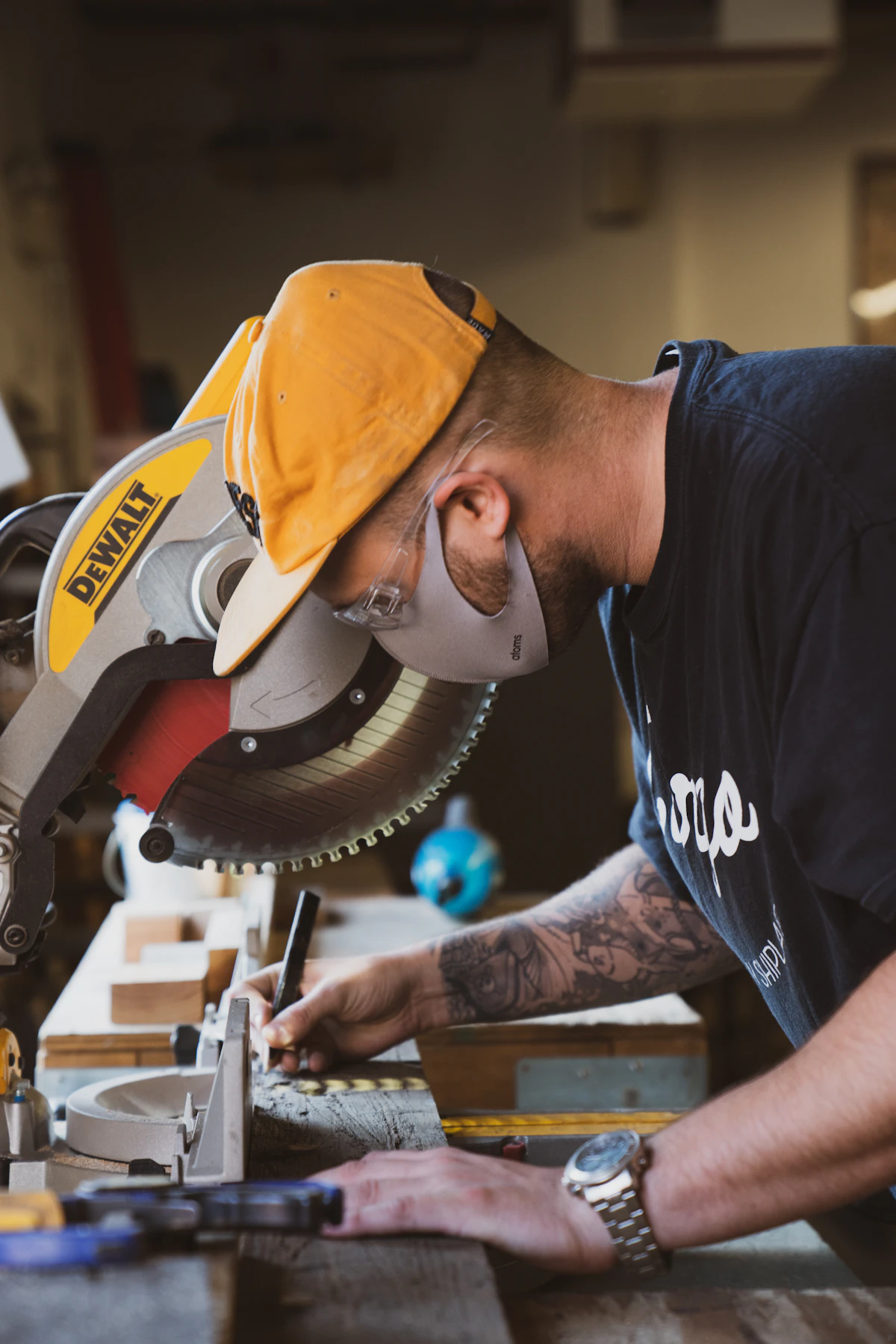 Woodworking tools and timber at a workbench